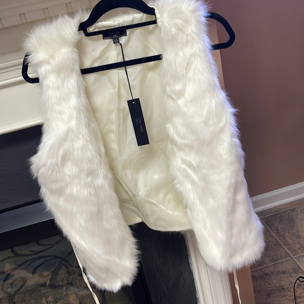 Furry white vest